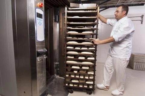 Baker makes the bread Stock Photos