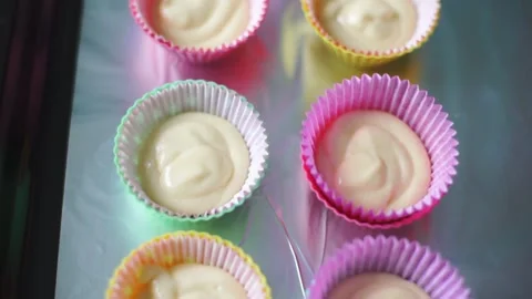 Baker makes cupcakes Stock Footage 143584254