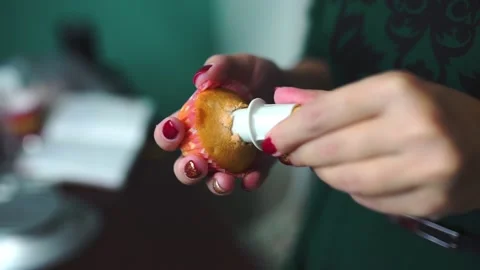 Baker makes cupcakes Stock Footage 143584377