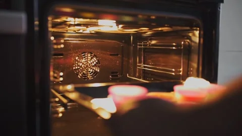 Baker makes cupcakes Stock Footage 143584752