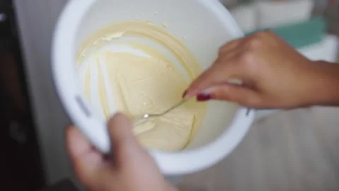 Baker makes the dough making cake Stock Footage 143584972