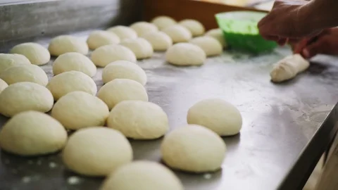 Baker makes pie of delicious dough on metal table closeup Stock Footage 124587000