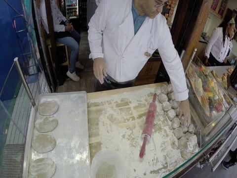 Baker making baked goods at Munich Germany Oktoberfest 스톡 동영상 80495258