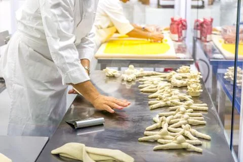 Baker making bread Stock Photos