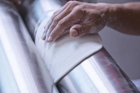 Baker making dough with machine Stock Photos