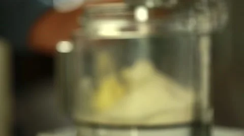 A baker making a fresh berry fruit tart desert with food processor Stock Footage 40481705