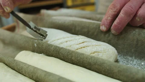 Baker making fresh dough in her kitchen Stock Footage 201471702