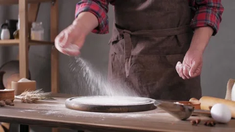 Baker man making dough and bakery ingredients for homemade bread cooking Stock Footage 154812124