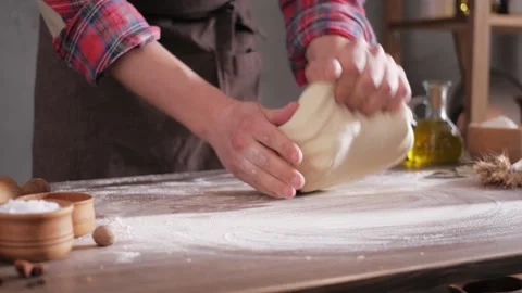 Baker man making dough and bakery ingredients for homemade bread cooking Stock Footage 154812128