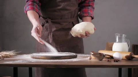 Baker man making dough and bakery ingredients for homemade bread cooking Stock Footage 154812130