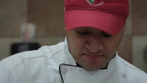 Baker mixes batter for a cake Stock Footage 231414785