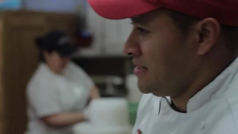Baker mixes cake batter Stock Footage 231414776