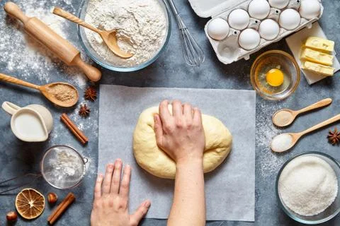 Baker mixing dough bread, pizza or pie recipe ingridients, food flat lay Stock Photos