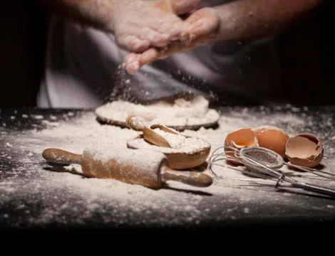 Baker prepares bread. Stock Photos