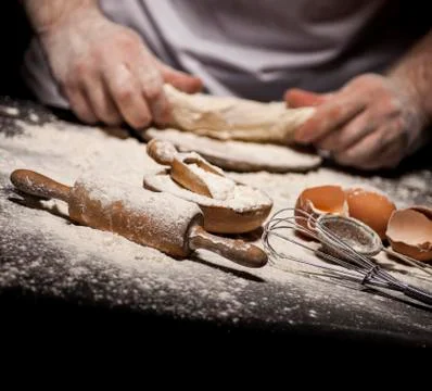 Baker prepares bread. Stock Photos