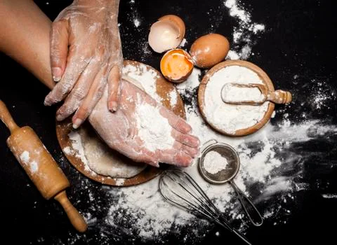 Baker prepares bread. Stock Photos