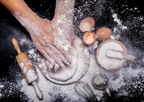 Baker prepares bread. Stock Photos