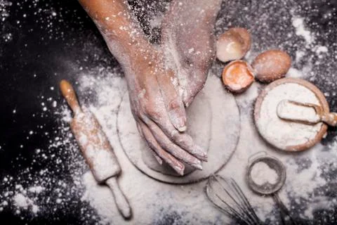 Baker prepares bread. Stock Photos