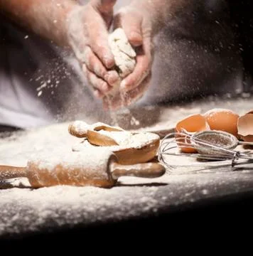 Baker prepares bread. Stock Photos