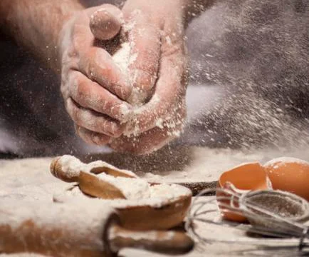 Baker prepares bread. Stock Photos