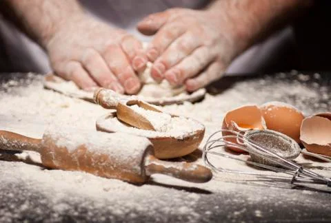 Baker prepares bread. Stock Photos