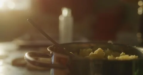 Baker prepares the cake using various ingredients Stock Photos
