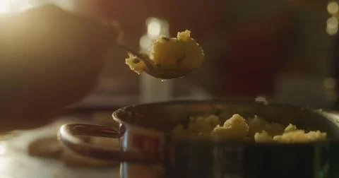 Baker prepares the cake using various ingredients Stock Photos