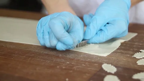 The baker prepares decor elements for bread 스톡 동영상 79997929