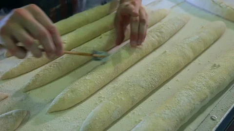 Baker Prepares Raw Bread For Baking 스톡 동영상 89576231