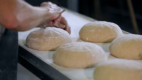 Baker Prepares Raw Bread For Baking 스톡 동영상 89576612