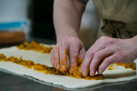 Baker preparing vegetable pastries Stock Photos