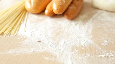 Baker put bread on table, close up, dolly shot Stock-Footage 65511723