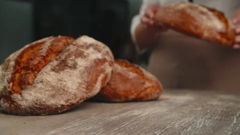 The baker puts bread to another bread. cornbread Stock Footage 201547970