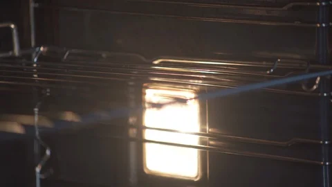 Baker puts pie in baking dish into the oven. Cake and bakery products. Vidéo 124754505