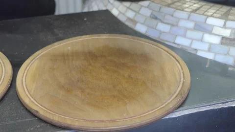 Baker removes freshly baked bread from oven Stock Footage 337285774