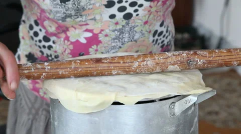 Baker rolls out the dough Video stock 68817502