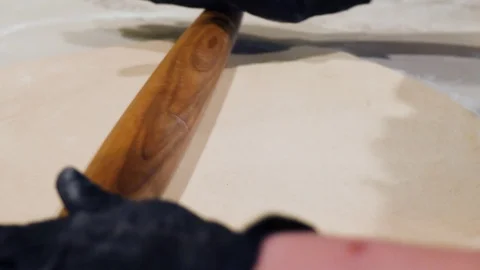 Baker Rolls Pizza Dough Stock-Footage 128927095