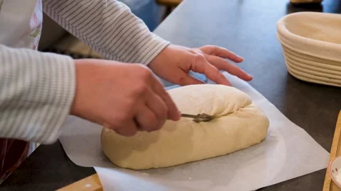 Baker Scoring Fresh Dough Before Baking Artisan Bread Stock Footage 340653101