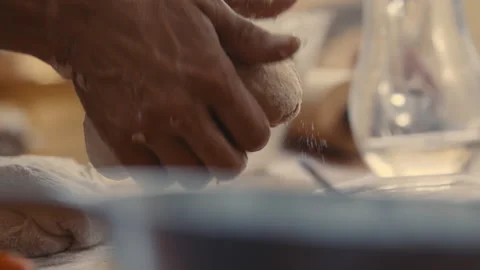 Baker separating bread into pieces Stock Footage 274680330