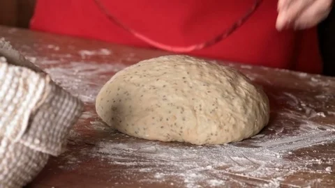 Baker shaping the dough before portioning 스톡 동영상 69990602