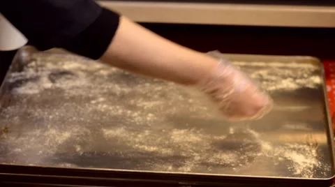 Baker sprinkle flour oven tray Vídeos de archivo 59579596