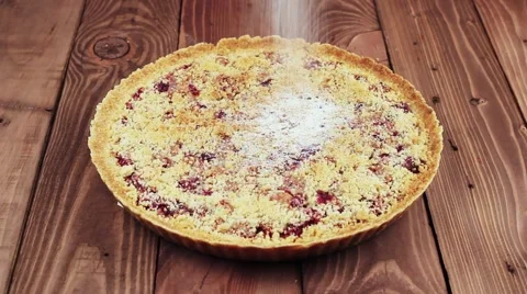 Baker Sprinkles Cherry Pie With Powdered Sugar. Cake is Very Beautiful. Stock-Footage 62280732