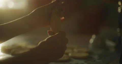 Baker starts to shape dough using hands Stock Photos