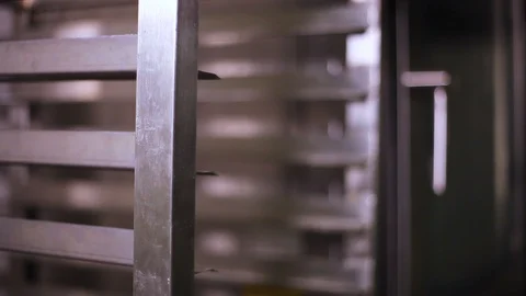 Baker takes out of the oven baking with bread Stock-Footage 106467321
