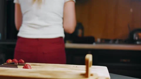 Baker waiting behind a prepared kitchen workstation, 4K Stock Footage 341121469