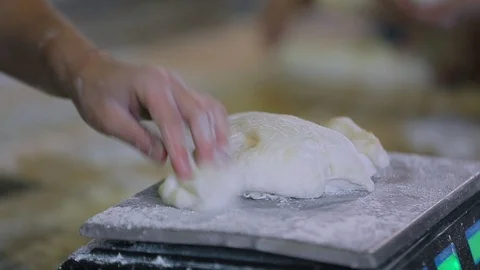Baker weigh dough   스톡 동영상 89576410