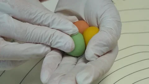 Baker in White Gloves Shaping Colorful Fondant Dough Balls Close Up Stock Footage 345293438