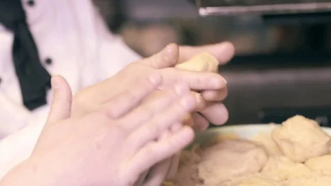Baker woman forms pie on a table. Hands slowmo Stock Footage 75048124