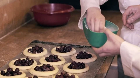 Baker woman forms pie on a table. Hands slowmo Stock Footage 75048148