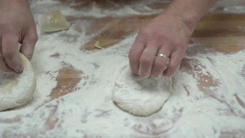 A baker working with dough and flower Stock Footage 145145646
